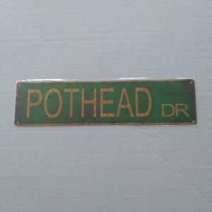POTHEAD DR. Sign